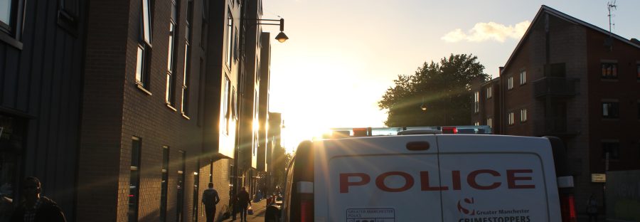 Police van in the sunset