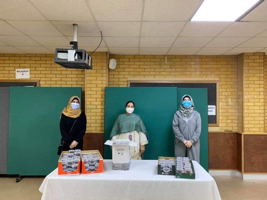 Volunteers at Khizra Mosque with dates for NHS workers