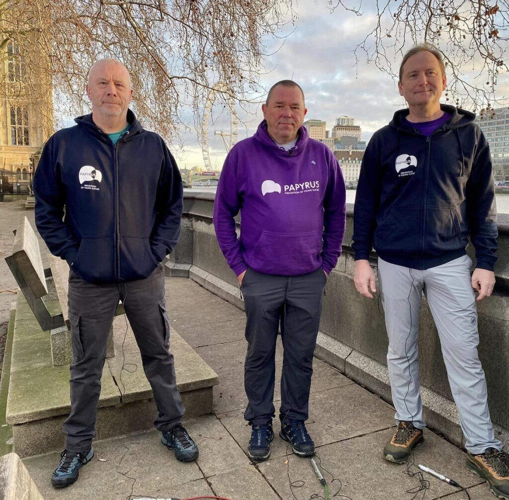Three dads, Mike Palmer, Andrew Airey, and Tim Owen outside parliament building