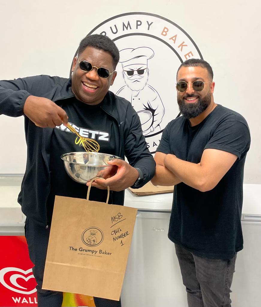 Youtuber Michael Shublacker whisks at Cheetham's artisan baking business