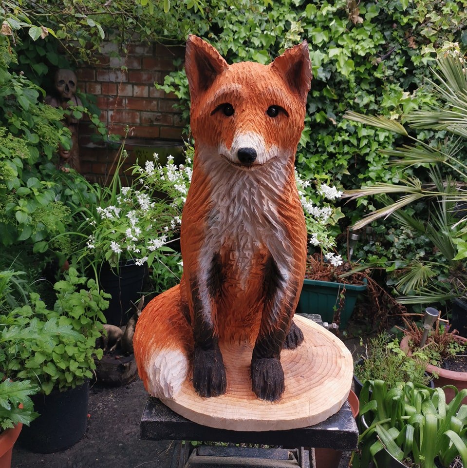 Red fox wood carving designed by Karl Macauley 