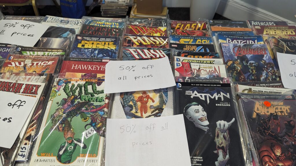 Discounted comics available for purchase near the door on free comic day at Manchester comic and sci-fi fair