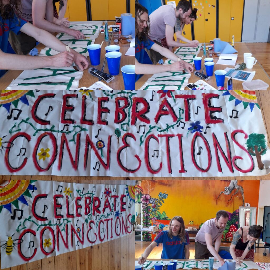 People making the Celebrate Connections pop-up music banners at a  workshop