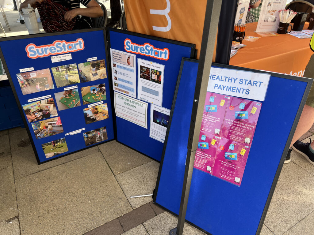SureStart's information boards about their stay and play sessions and healthy start payments.