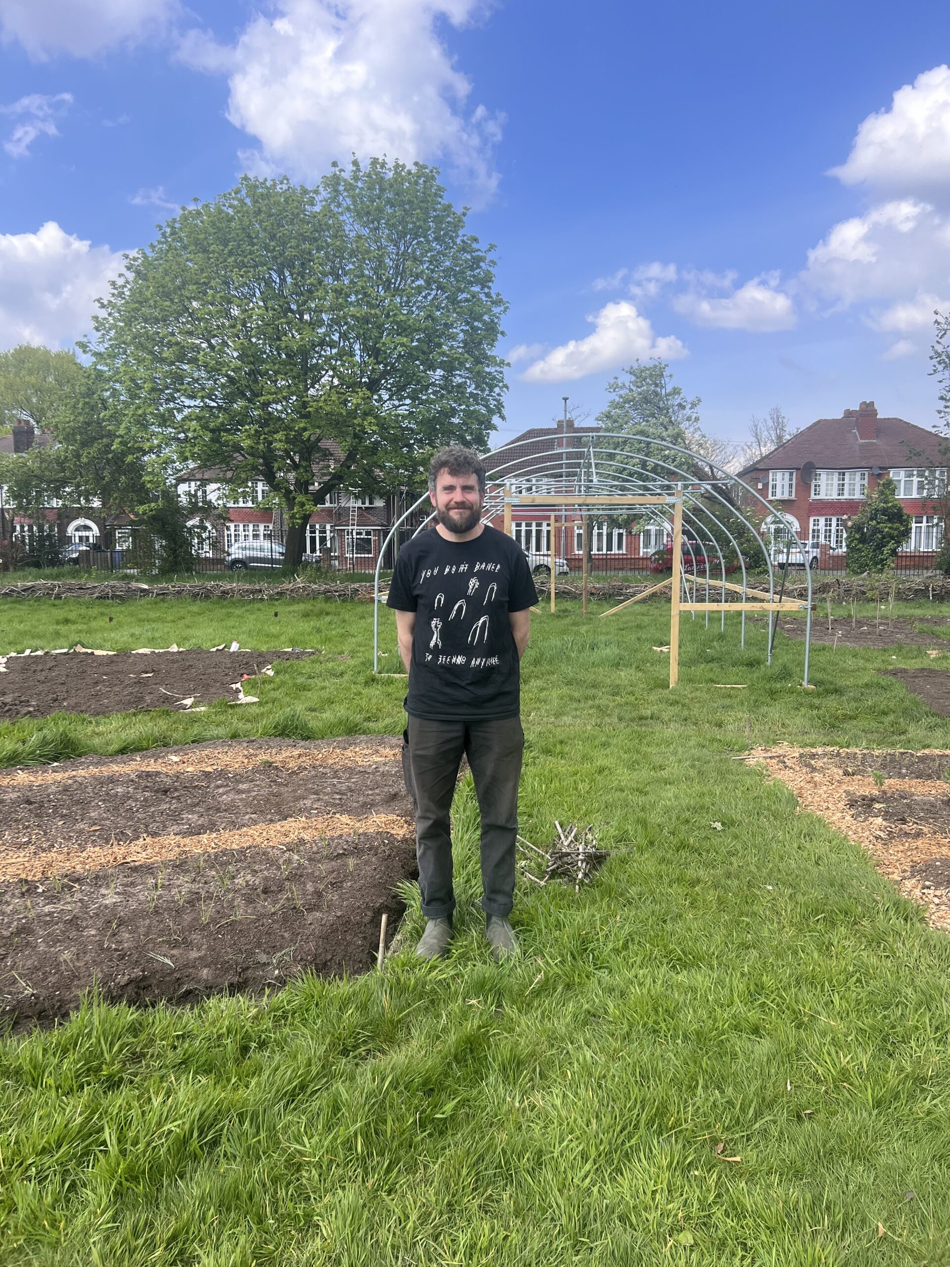 Mike, Director of MUD standing at Forever Fields site in Whalley Range