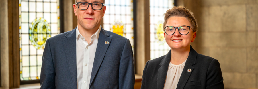 Manchester chief executive Tom Stannard stood next to council leader Bev Craig inside the town hall