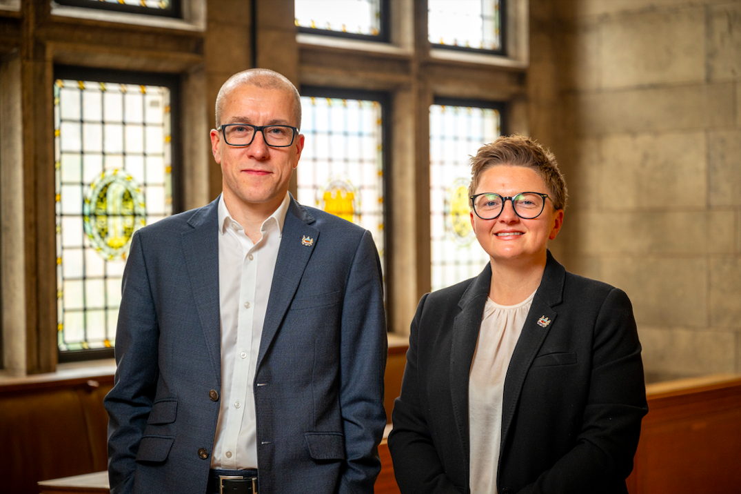 Manchester chief executive Tom Stannard stood next to council leader Bev Craig inside the town hall