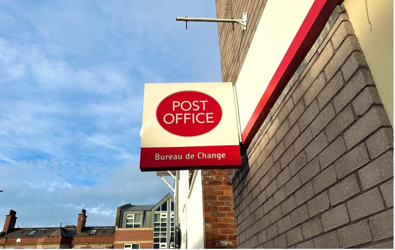 Post Office sign outside branch in Manchester