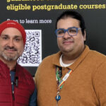 Faraz Arian (left) wears a red beanie and gilet over a blue shirt and grey ripped jeans. He is smiling at the camera and holding a sheet of paper. On the right of the image is Amraze Khan, who wears a yellow jumper and light jeans. He is also smiling into the camera.