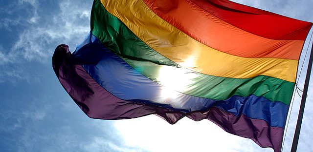 640px-rainbow_flag_and_blue_skies
