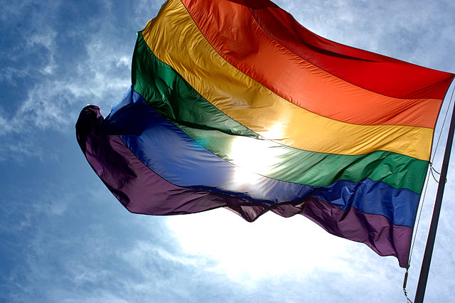 640px-rainbow_flag_and_blue_skies