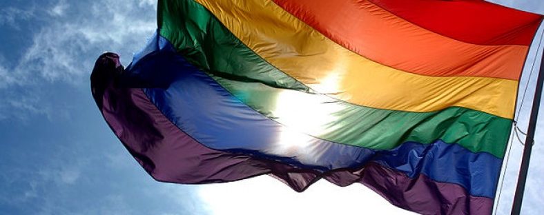 640px-rainbow_flag_and_blue_skies