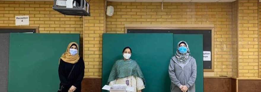 Volunteers at Khizra Mosque with dates for NHS workers