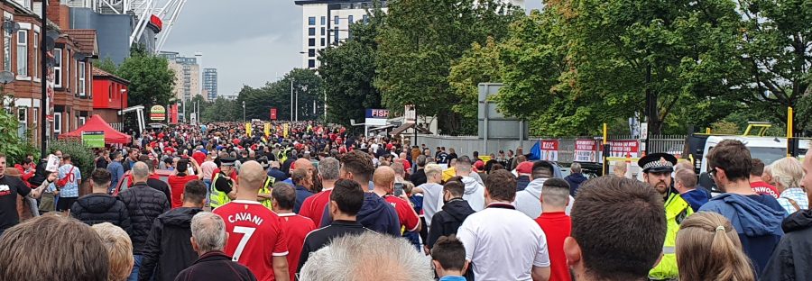 sports_fans_leaving_old_trafford_tram
