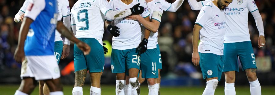 The Manchester City team celebrating after the Riyad Mahrez goal in the 60th minute