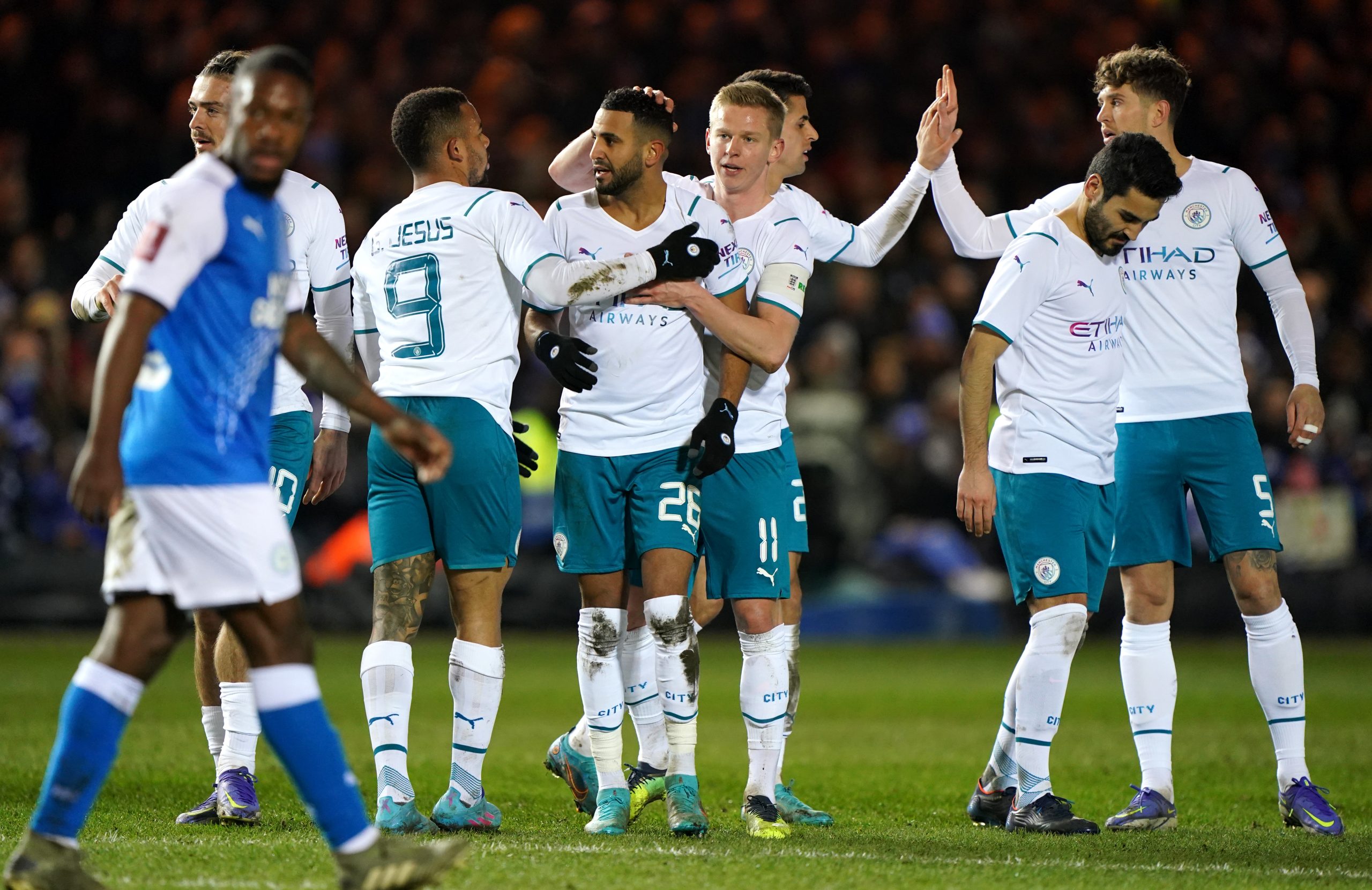 The Manchester City team celebrating after the Riyad Mahrez goal in the 60th minute
