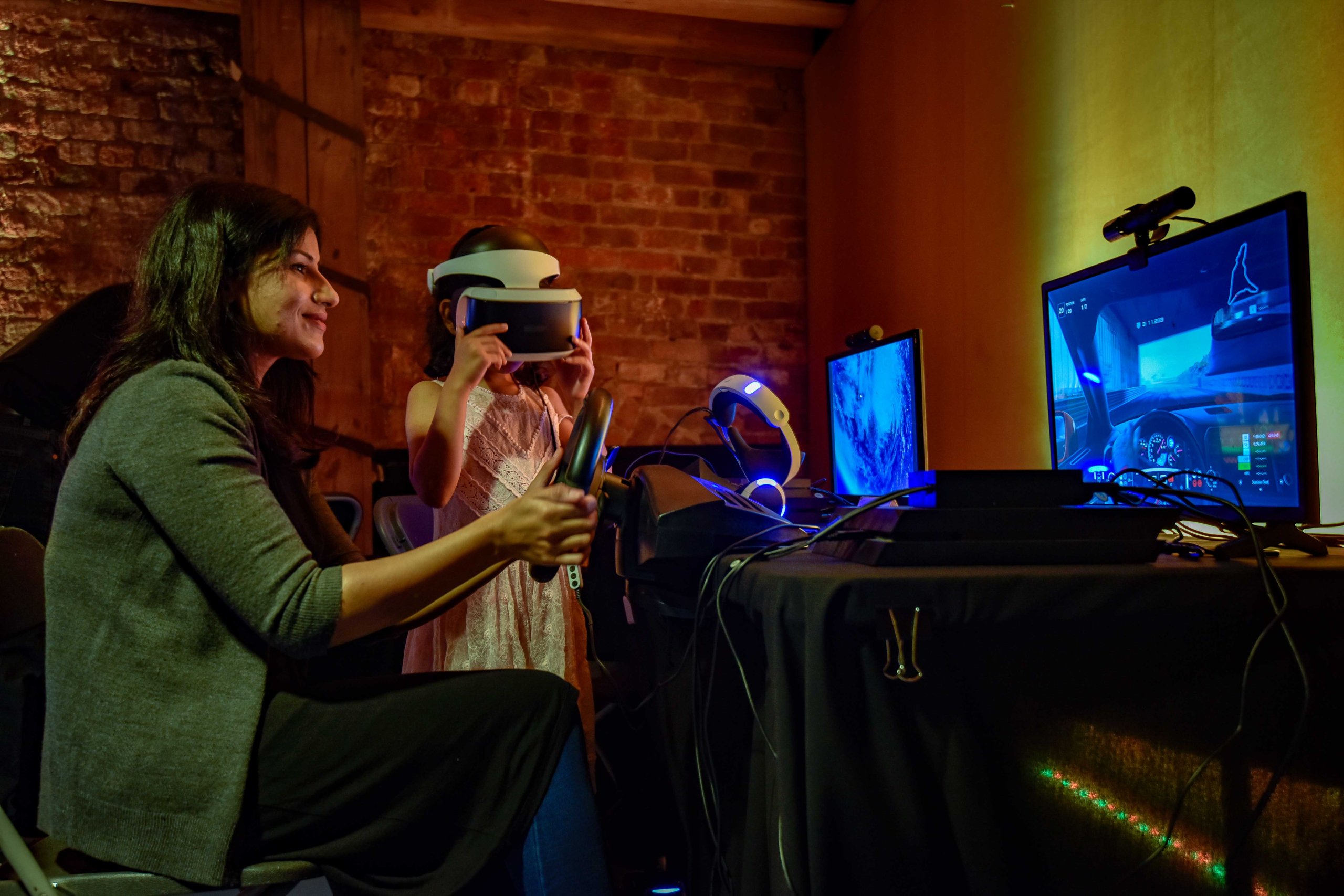 family_playing_video_games_at_the_science_and_industry_museums_power_up_gaming_experience