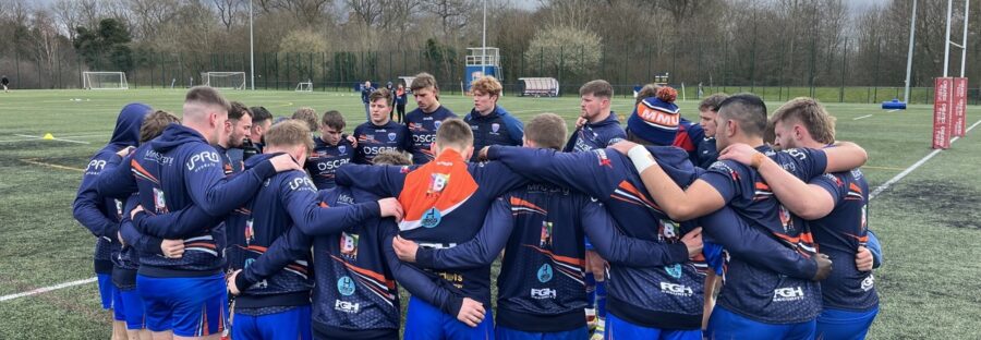 MMURU 1's team huddle.