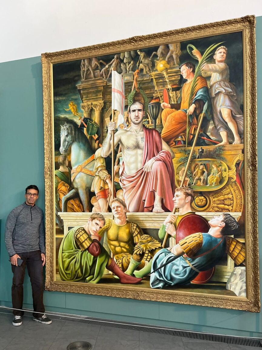 Michael Browne stood next to Eric Cantona painting at National Football museum.