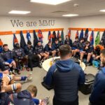 The Man Met rugby squad preparing for a game n their dressing room