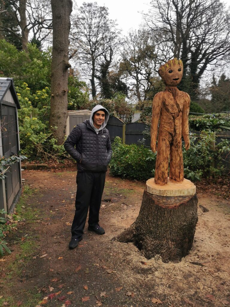 Artist Karl Macauley wood carving Wood carving of Groot, Guardians of the Galaxy with artist Karl Macauley