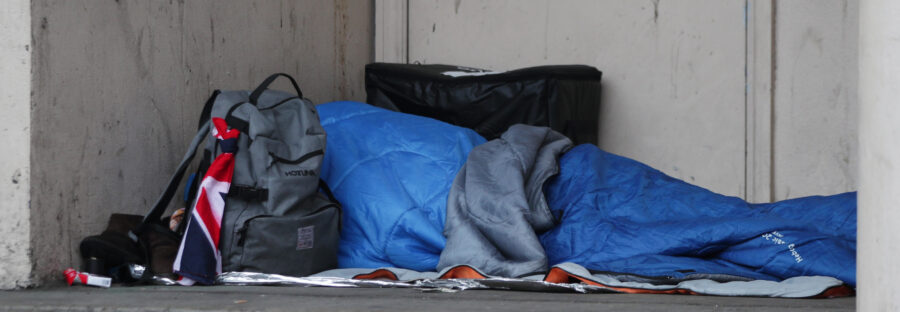 Rough sleeper on steps. Photo Credit: Yui Mok/PA Wire