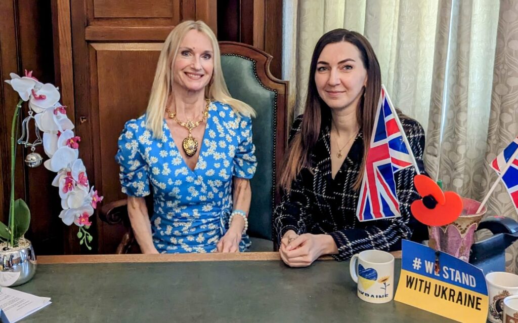 Alina smiling with the Deputy Mayoress of Stockport