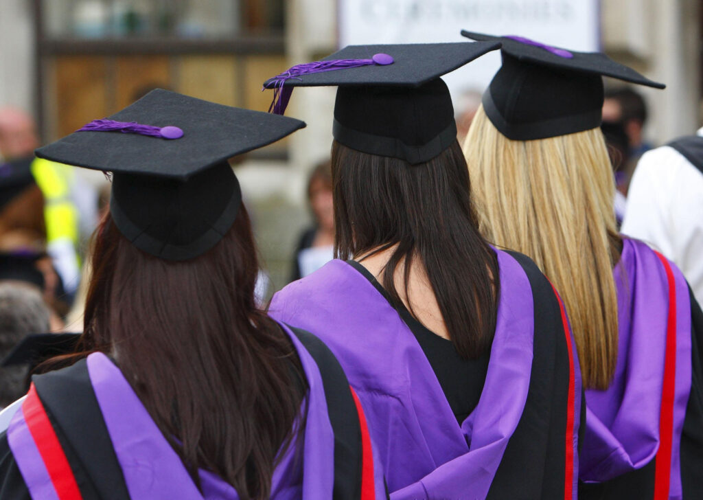 File photo dated 16/07/08 of university graduates, as nine in ten students starting their first year at university believe the cost-of-living crisis has made them more worried about going to university from a financial perspective, according to a survey.