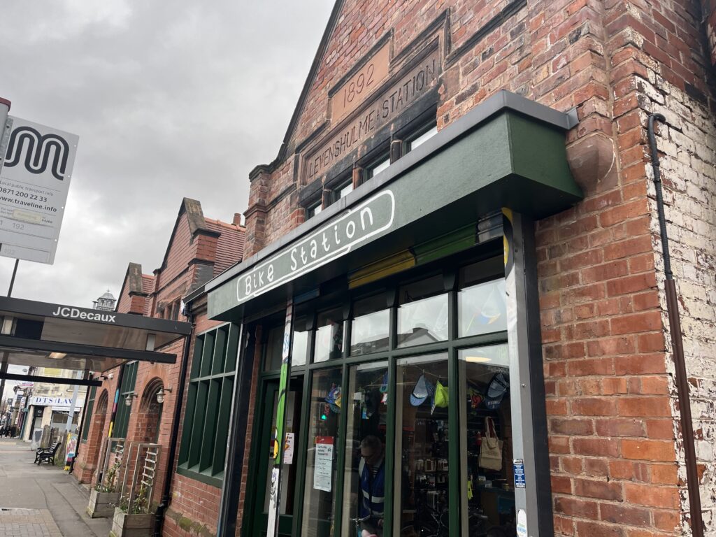 The front of a shop named Bike Station.