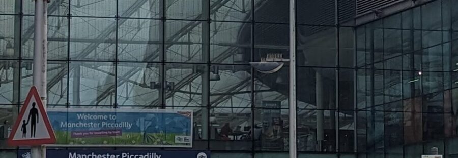 An image of Manchester Piccadilly station as the faster line to Liverpool is announced