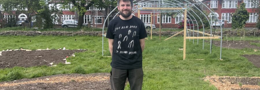 Mike, Director of MUD standing at Forever Fields site in Whalley Range