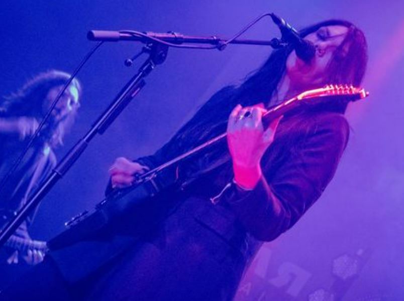 A A Williams, vocialist with guitar, photo taken by Kayleigh Fryer