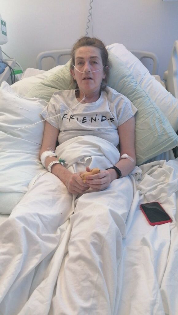 Woman in hospital bed