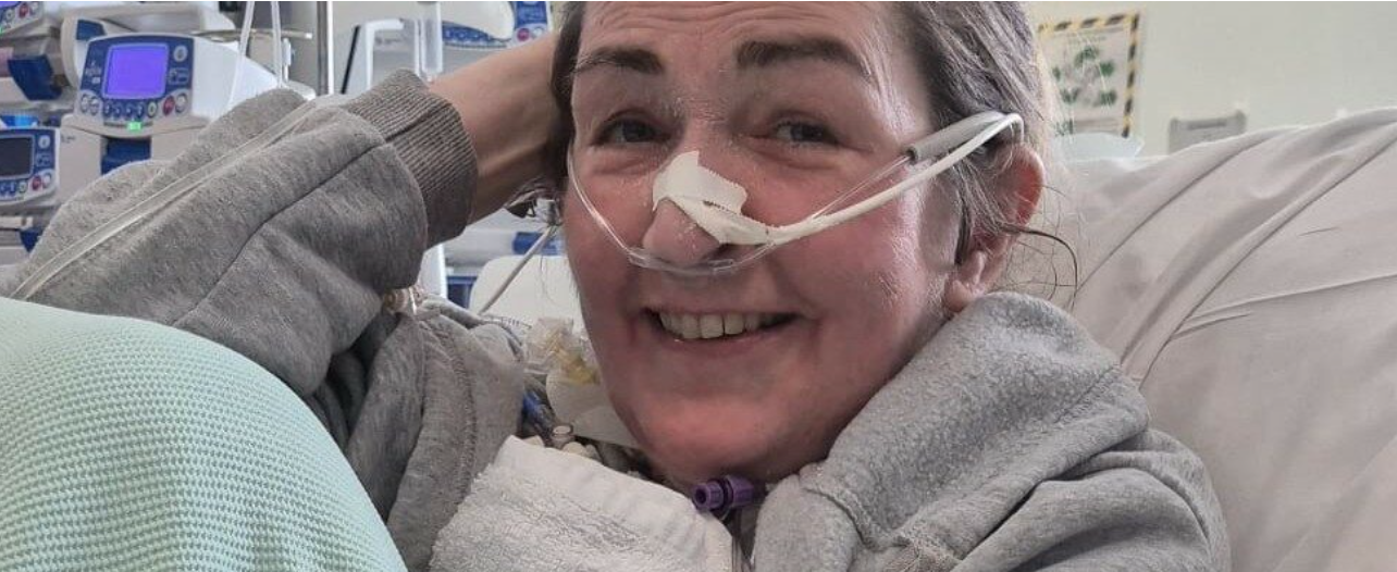 Woman in hospital bed