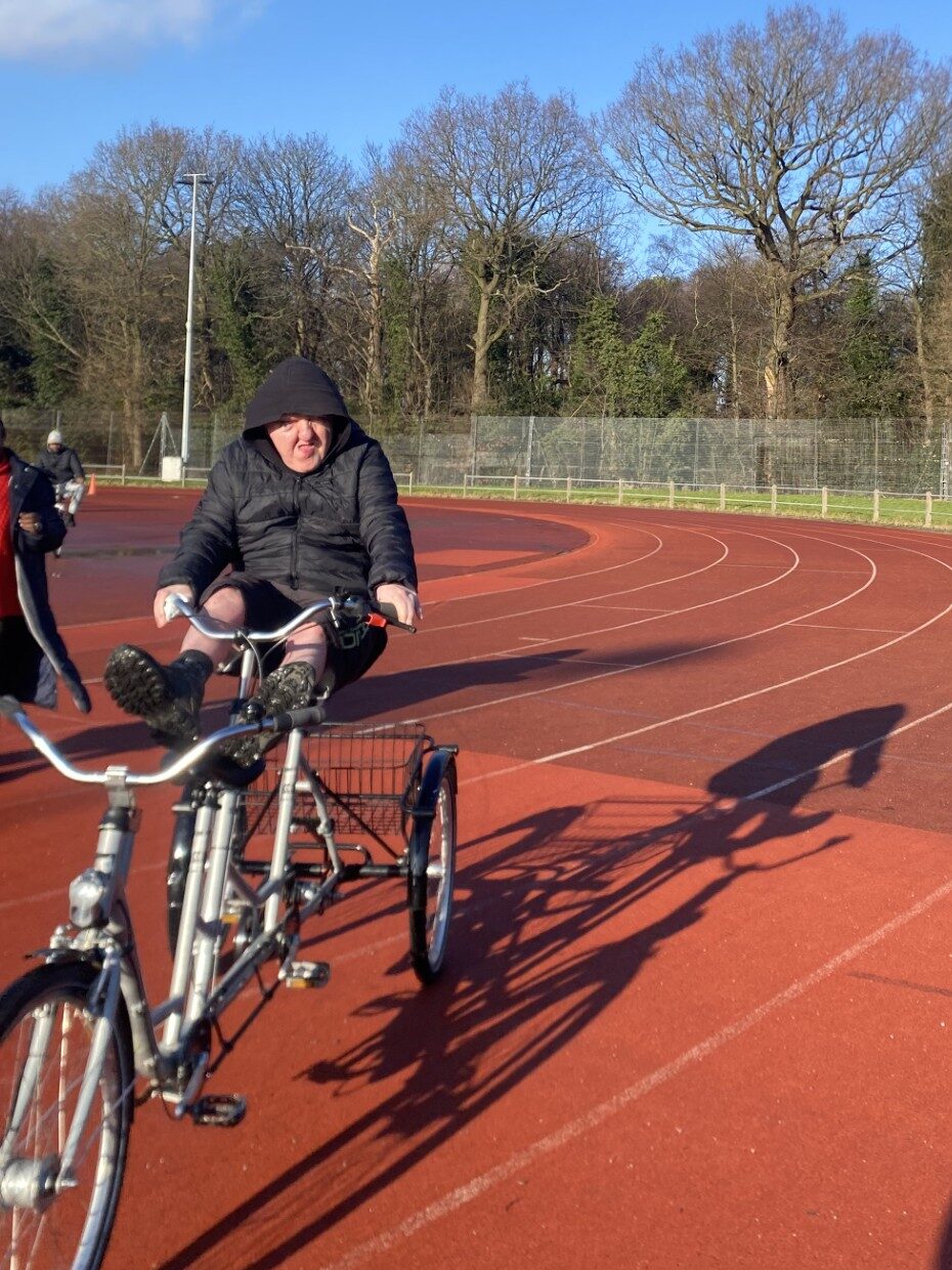 One of the cyclists is pictured using the modified bikes.