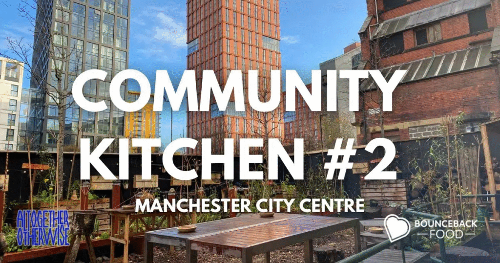 Picture of outdoor area with buildings behind and read "Community Kitchen 2 Manchester City Centre"