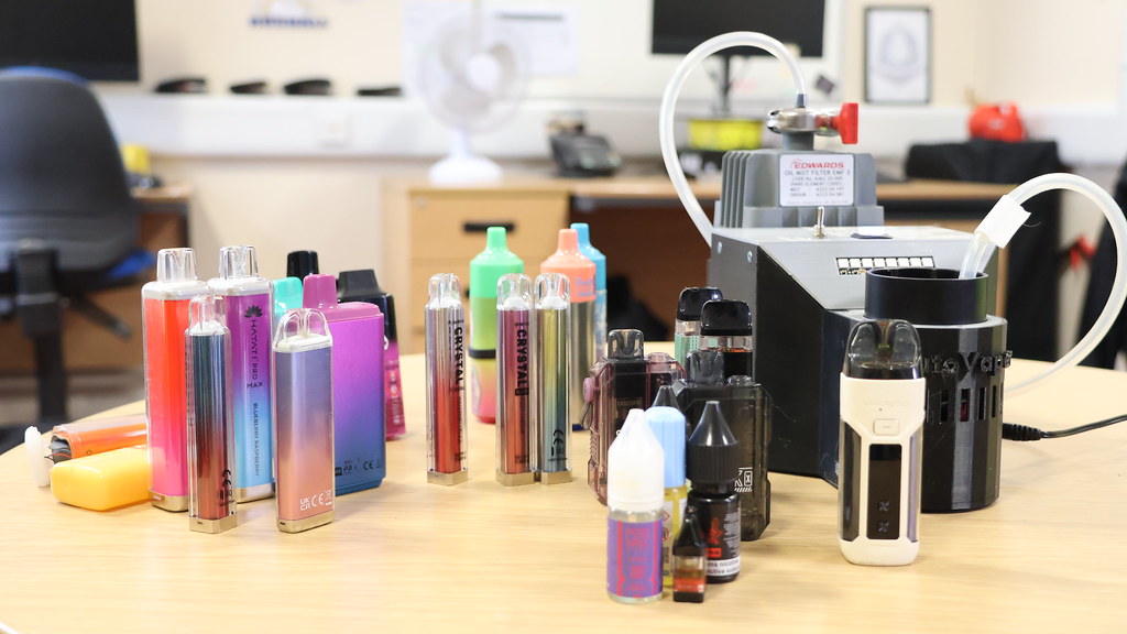 A photo of confiscated vapes with the detection device.