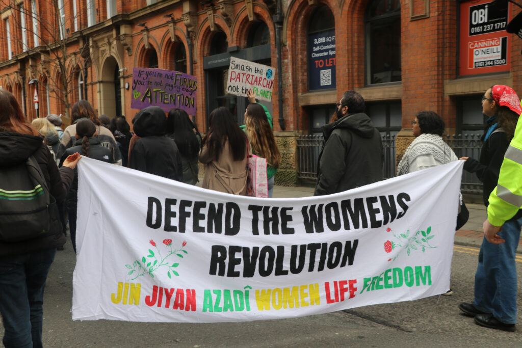 Banner at the back of the protest