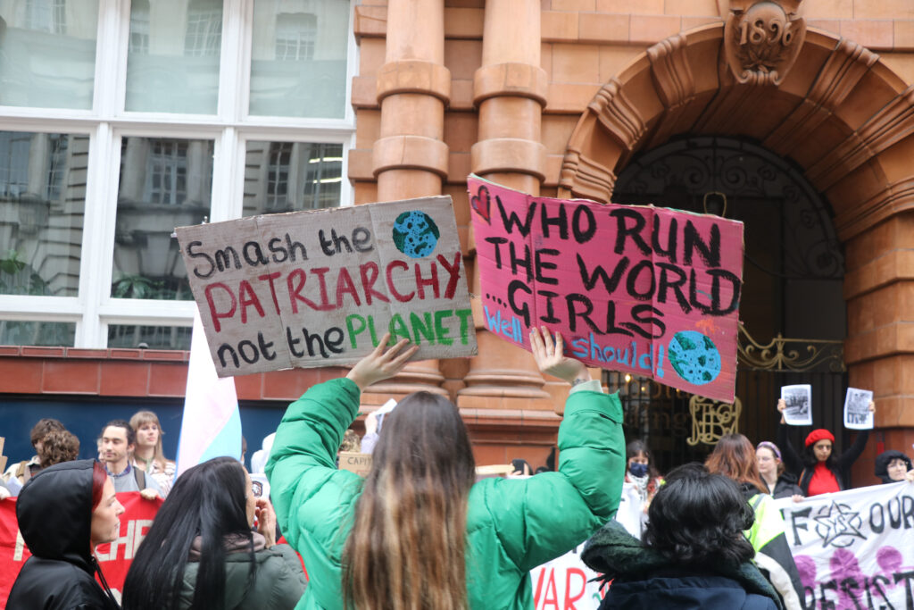 Signs held at the protest